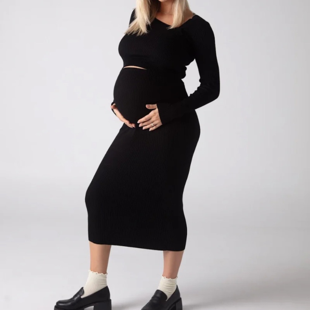 Chic Black Maternity set .
High waisted skirt with long sleeve top.